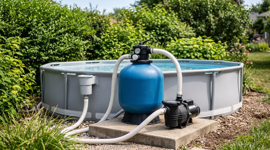 A sand filter and pump on an above-ground pool equipment pad