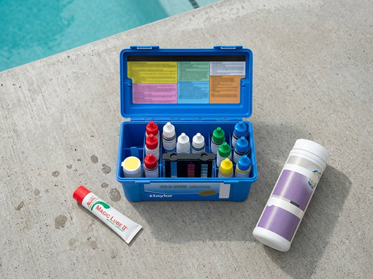 Pool test kit, silicone lube, and stabilizer on a daylight deck