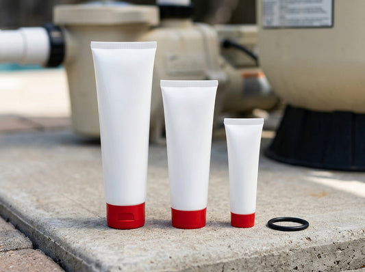 Silicone and PTFE pool lubricant tubes with o-ring on equipment pad