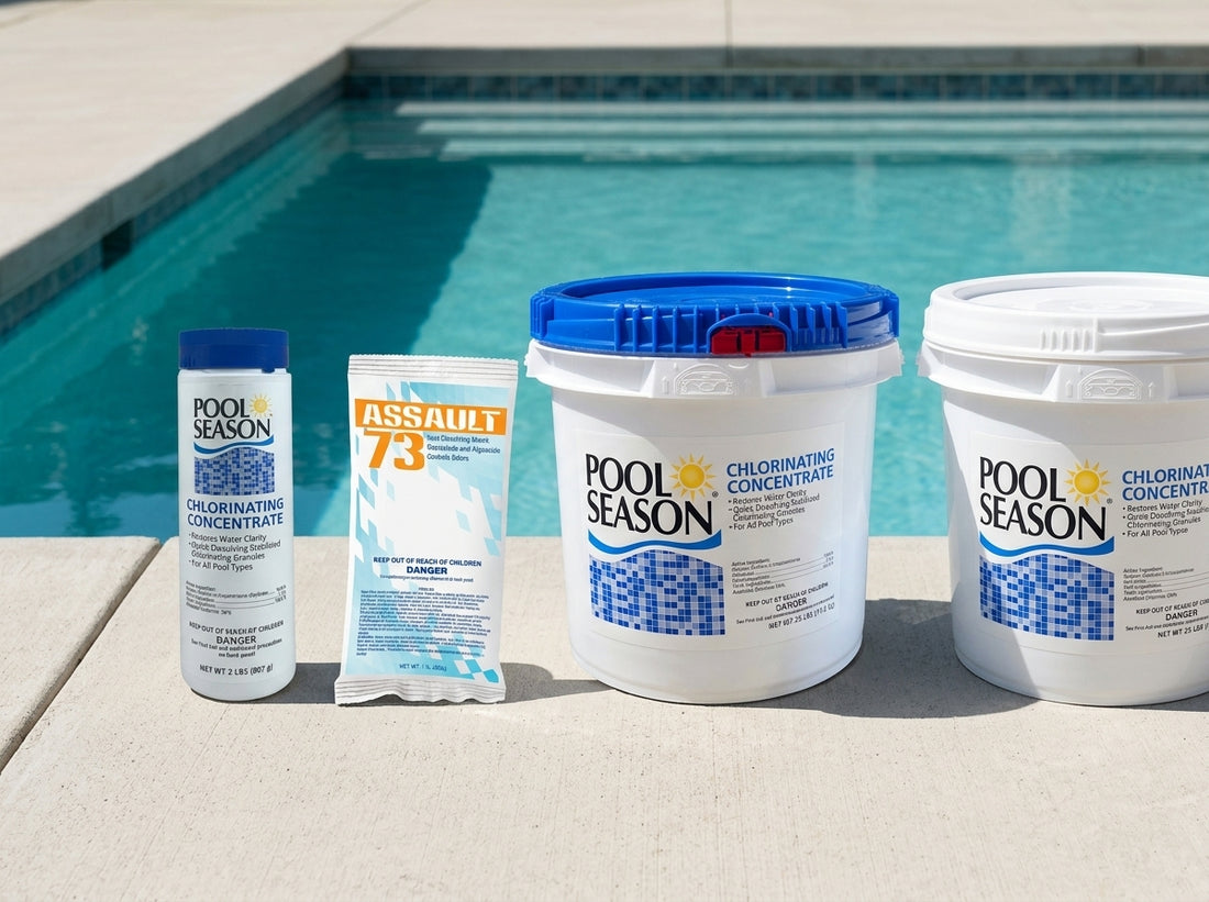 Four pool shock products lined up on a pool deck in daylight
